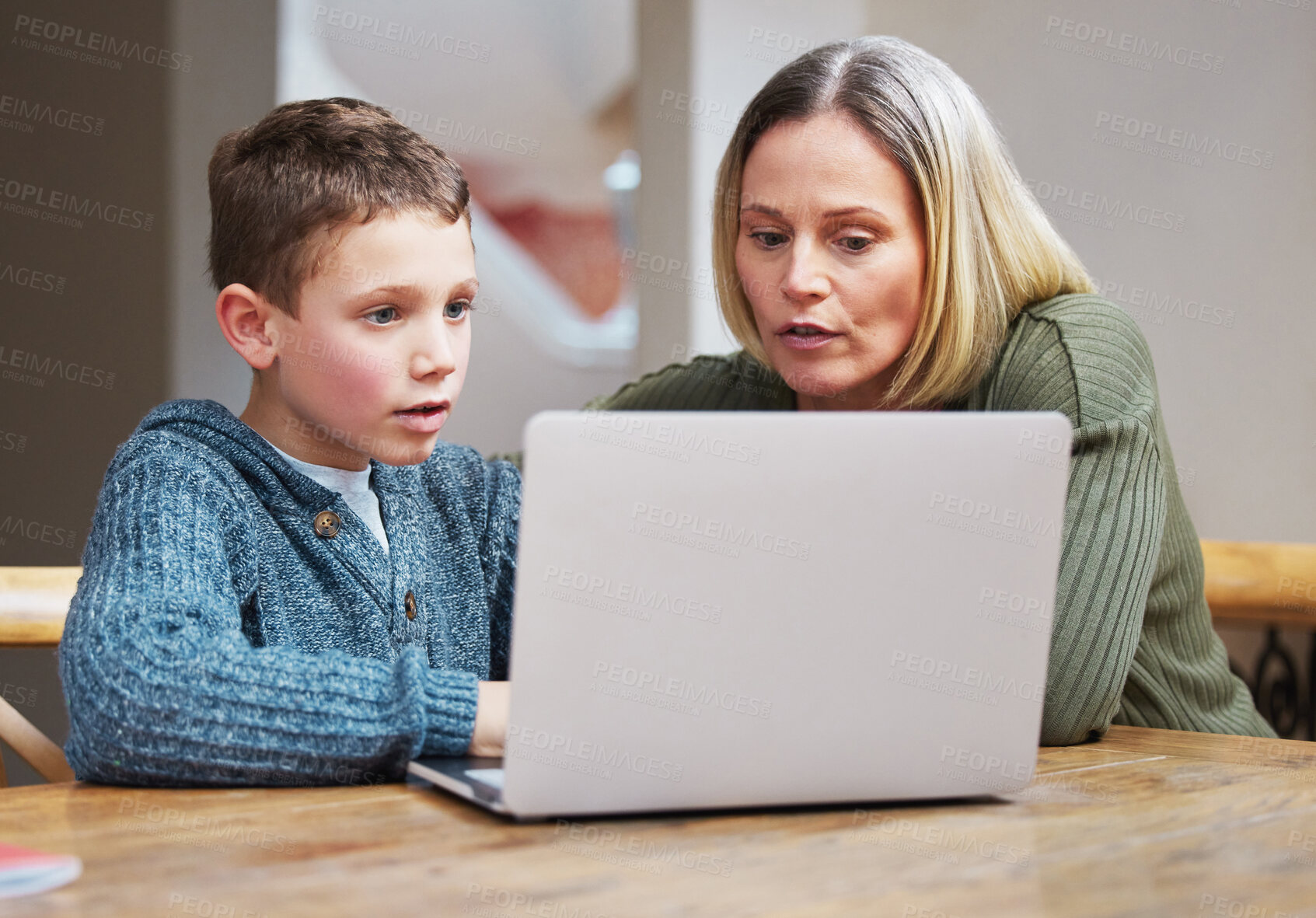 Buy stock photo Laptop, education and mother with child in home for online learning, school project and lesson. Family, student and mom teaching boy on computer for help with studying, homework and assignment