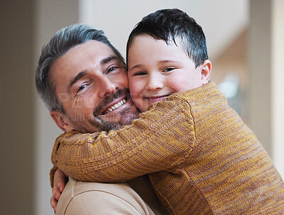Buy stock photo Shot of a father hugging his son