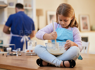 Buy stock photo Girl, child and bowl for baking in kitchen on table with mixing batter for cookies, dessert or cake recipe. Cooking, kid or prepare ingredients for learning, development or culinary education in home