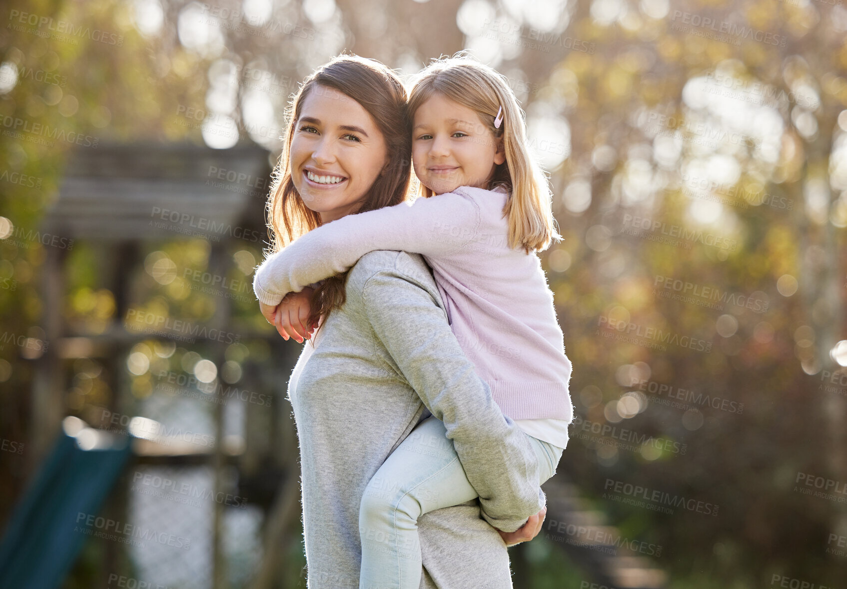 Buy stock photo Portrait, mother and girl with piggyback in outdoor park for game, fun and bonding together. Nature, relax and happy woman with daughter on back for support, vacation or weekend trip to Canada