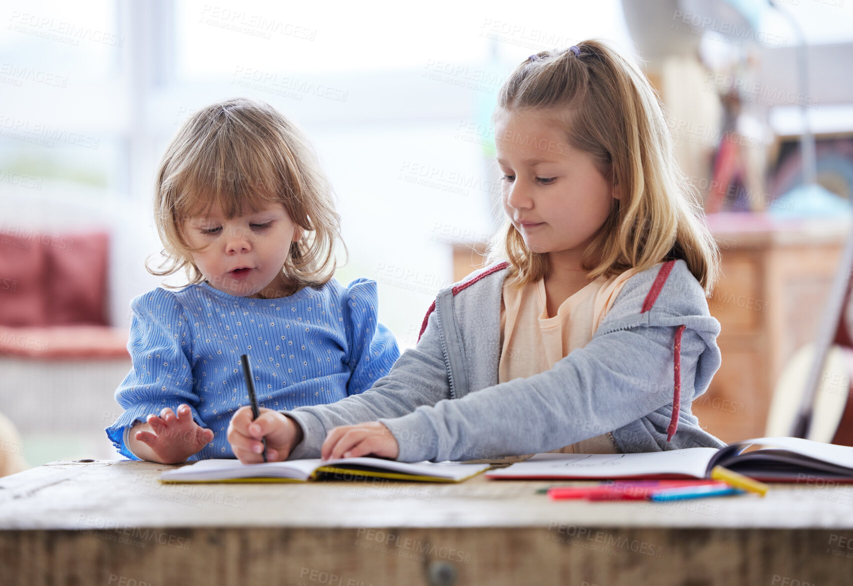 Buy stock photo Children, writing and notebook together in home, education and learn with sister or child development or growth. Bonding, drawing and pencil on paper for sketch, creative skills and girl in apartment