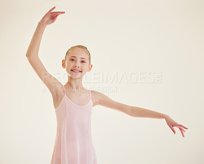 Buy stock photo Shot of a young ballerina dancing in a studio