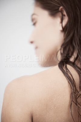 Buy stock photo Shot of a woman taking a shower