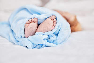 Buy stock photo Shot of a little baby boys feet while he sleeps