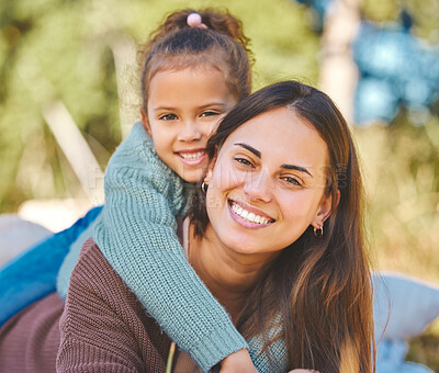 Buy stock photo Shot of a mother spending time with her daughter outside