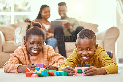 Buy stock photo Portrait, children and building blocks on floor in living room for development, learning or educational toys. Black family, kids with parents for activity, playing game or bonding together in home