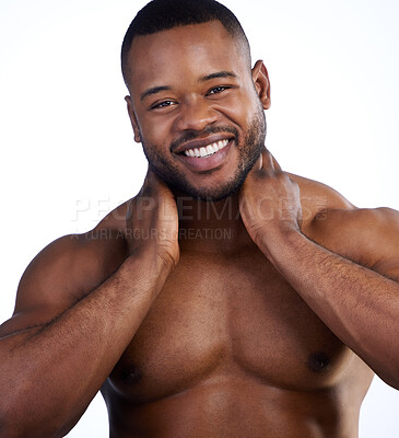 Buy stock photo Studio portrait of a handsome young man posing against a white background