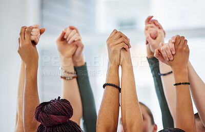 Buy stock photo Cropped shot of an unrecognisable group of women huddled together and holding hands after yoga practise
