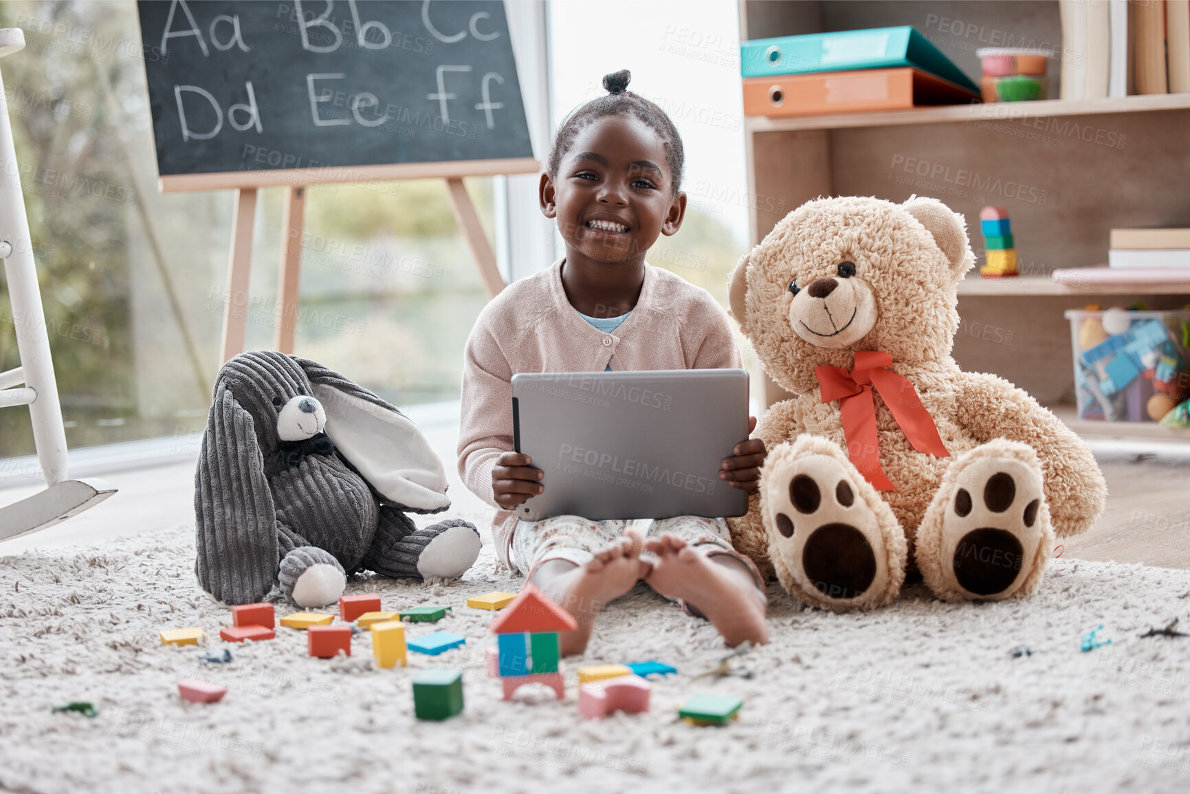 Buy stock photo Portrait, child and tablet in home with smile for e learning, entertainment or video streaming in living room. Happy, black girl and internet on tech for kids website, online school and development