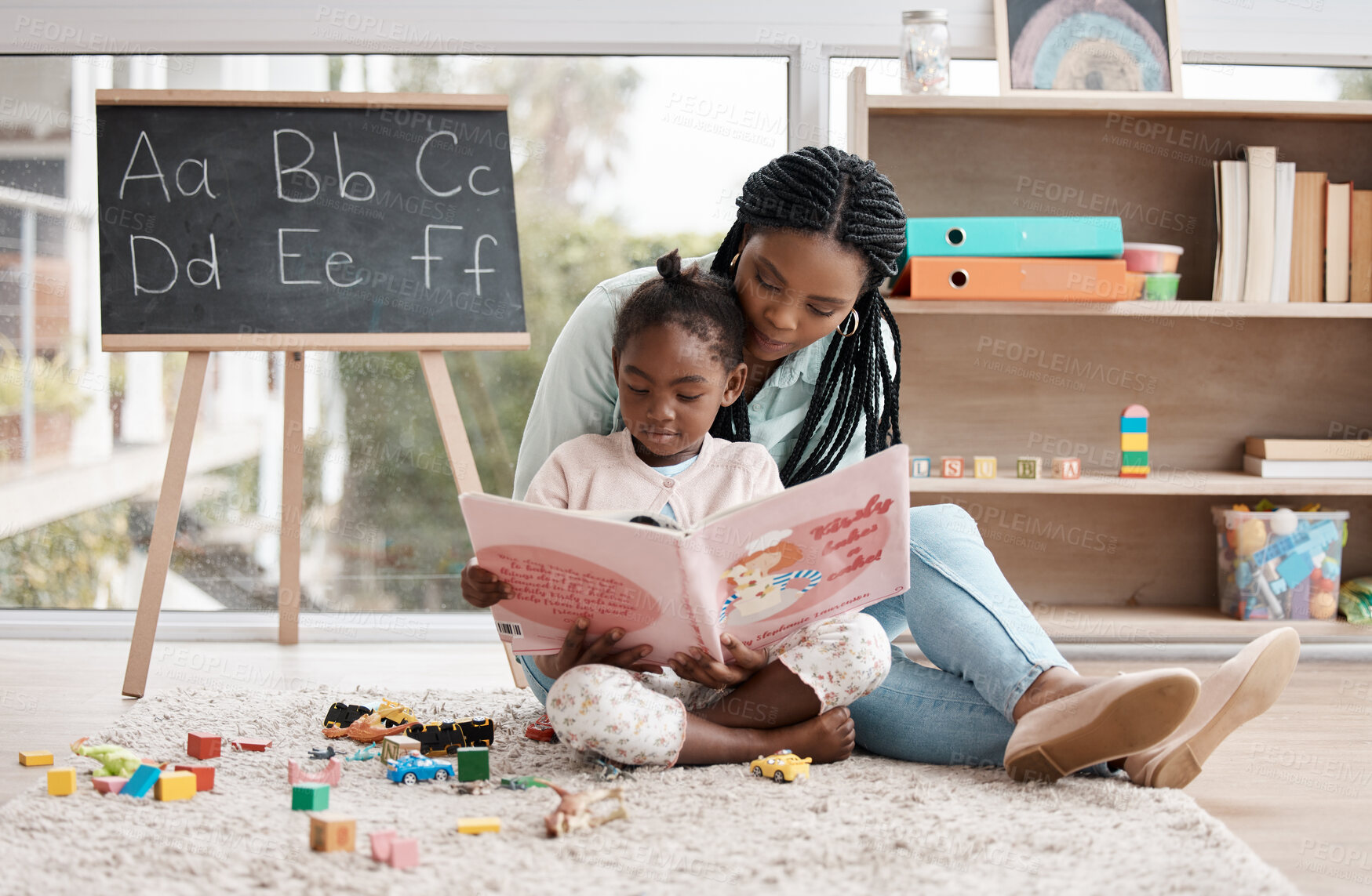 Buy stock photo House, girl and mother reading a book, relax and bonding together with language, learning and storytelling. Development, family and single parent with baby, mama and kid with fairytale and education