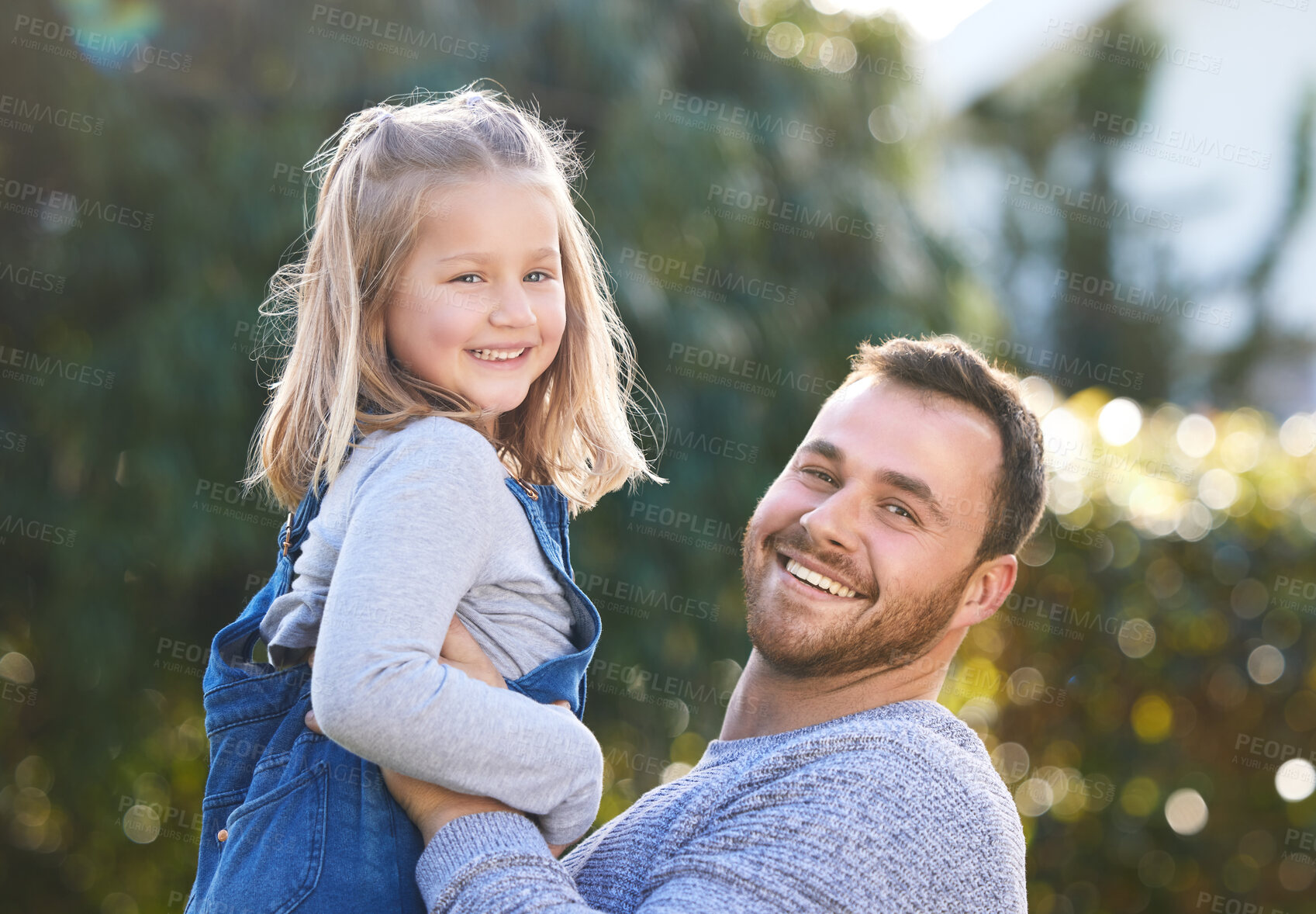 Buy stock photo Portrait of a father and his little daughter bonding together outdoors