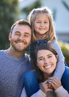 Buy stock photo Portrait of a happy family bonding together outdoors