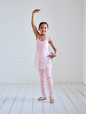 Buy stock photo Portrait of a little girl practicing ballet in a dance studio