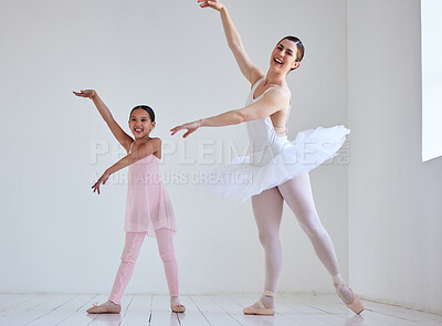 Buy stock photo Portrait of a little girl practicing ballet with her teacher in a dance studio