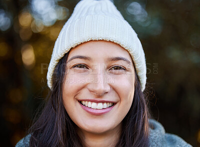 Buy stock photo Shot of an attractive young woman standing alone outside