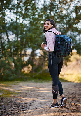 Buy stock photo Full length shot of an attractive young woman standing alone outside and carrying a backpack