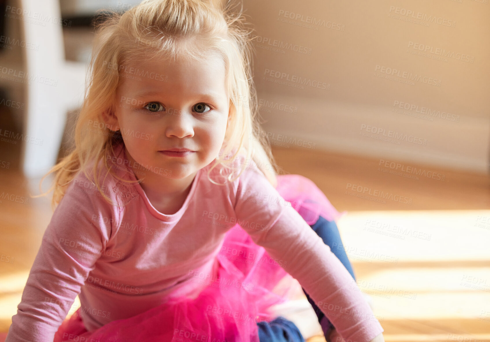 Buy stock photo Shot of an adorable little girl sitting on the floor in her bedroom