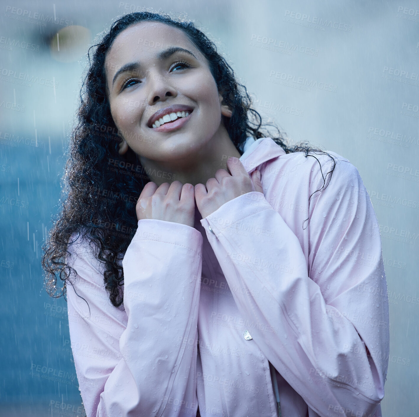 Buy stock photo Woman, outdoor and happy or thinking in rain on cold weather, winter and wet fun. Female person, raincoat and smile with thoughts in New York downtown for rainy fashion or style and satisfied