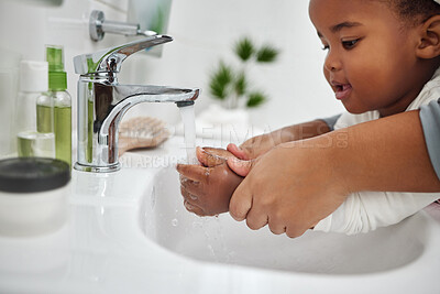 Buy stock photo Tap, washing and hands of toddler, hygiene and teaching of child by mother in bathroom, cute and girl. Home, healthy and cleaning of bacteria, baby and together with mom, water and routine in morning