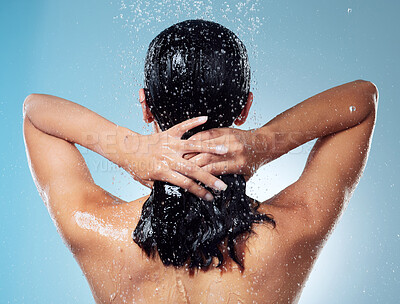Buy stock photo Shot of an unrecognisable woman washing her hair during her morning shower