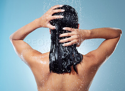 Buy stock photo Shot of an unrecognisable woman washing her hair during her morning shower