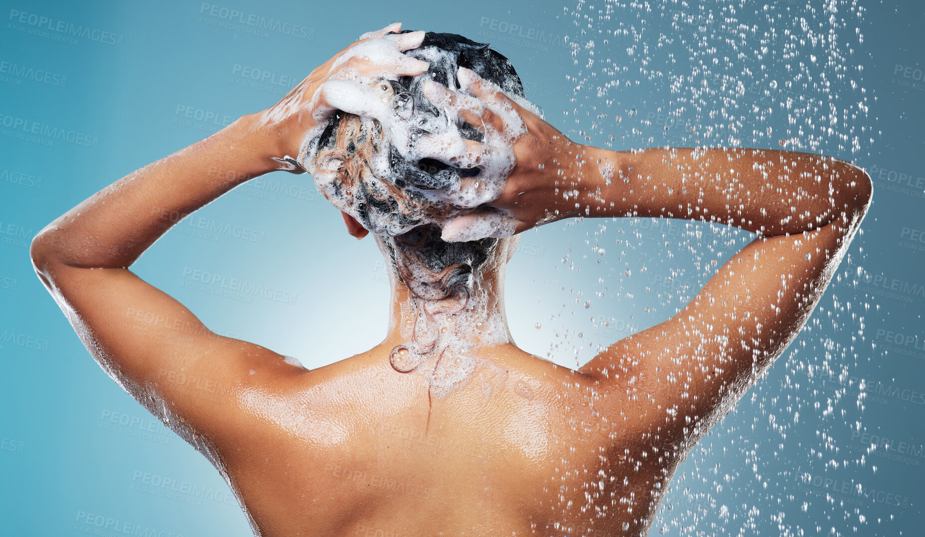 Buy stock photo Shot of an unrecognisable woman washing her hair during her morning shower