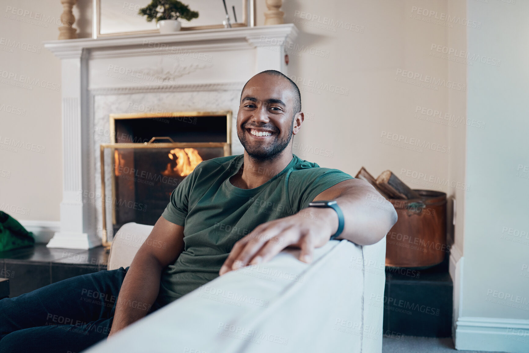 Buy stock photo Shot of a young man relaxing at home