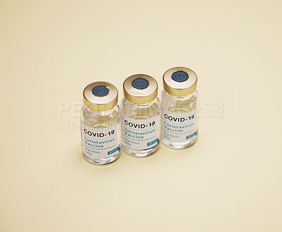Buy stock photo Shot of vaccines against a green background