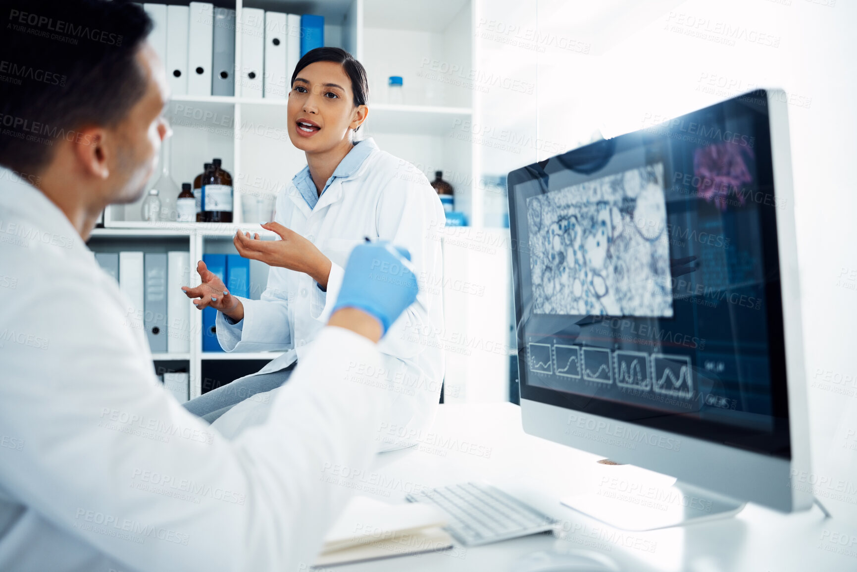 Buy stock photo Computer, discussion and team of scientists in laboratory studying microorganisms, dna or particles. Science, technology and pharmaceutical researchers work on medical experiment for rna on desktop.