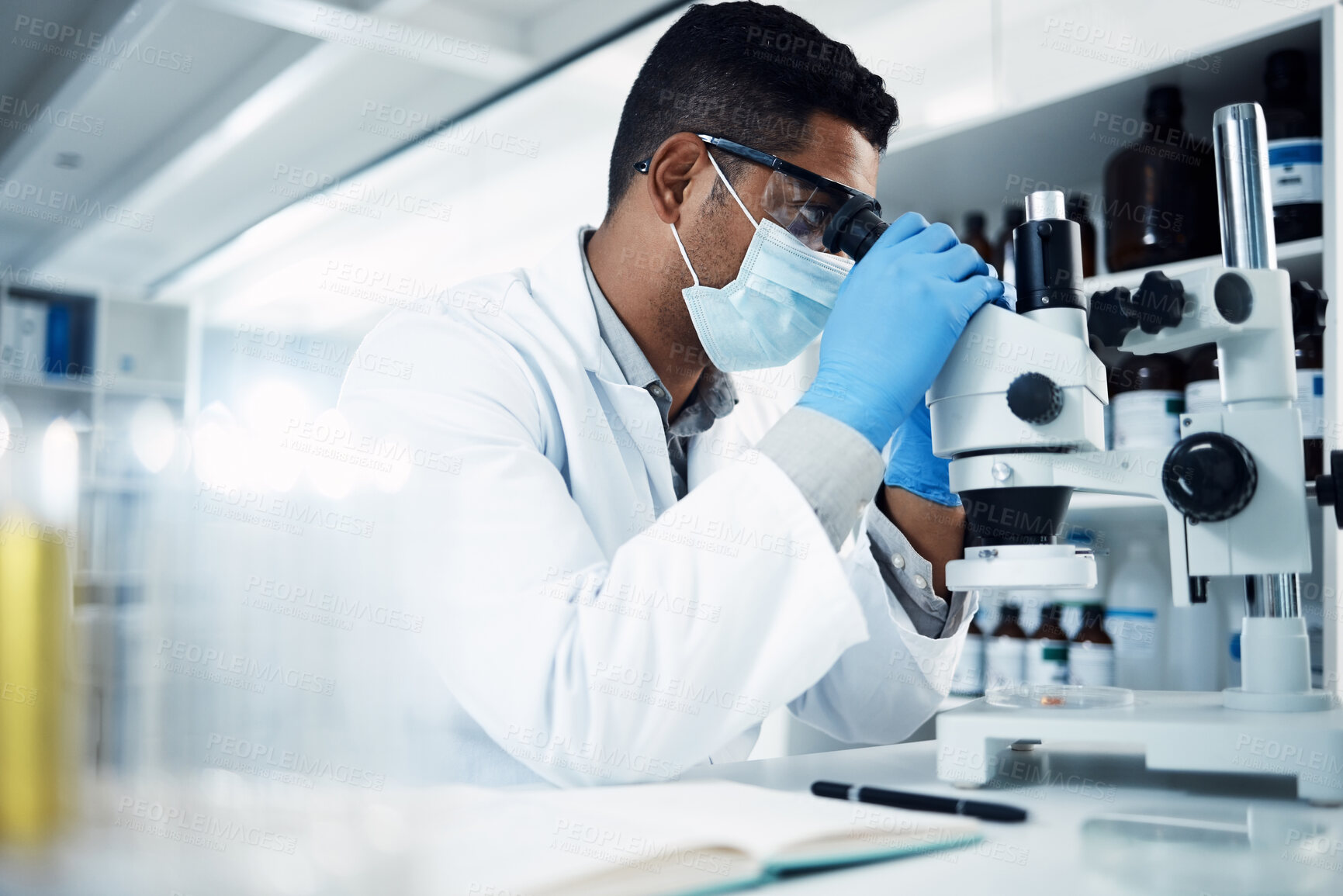 Buy stock photo Man, scientist and microscope, analysis and check DNA sample with science experiment in laboratory. Male doctor with mask, gloves and analyze data with scientific innovation and medical research