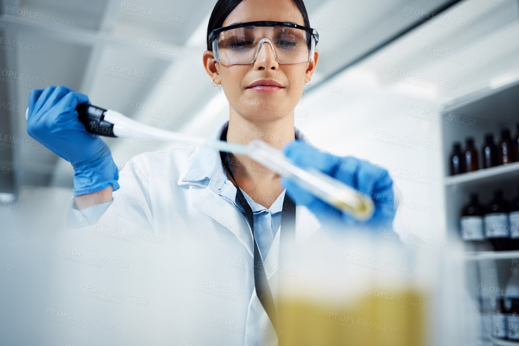 Buy stock photo Woman, vial or scientist in laboratory for medical innovation, life expectancy or antiaging medicine. Low angle,l test or healthcare biologist with chemistry liquid in research or science examination