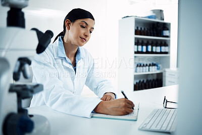 Buy stock photo Woman, scientist and writing notes in science research for discovery, breakthrough or information at lab. Female person or medical expert with notebook for scientific data or results in laboratory