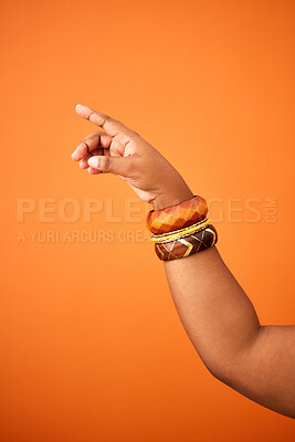 Buy stock photo Woman, pointing with hand in studio for news or guiding for direction, answers and instruction to vote for party. Person, isolated and gesture or sign on mockup for promo, contact us and announcement