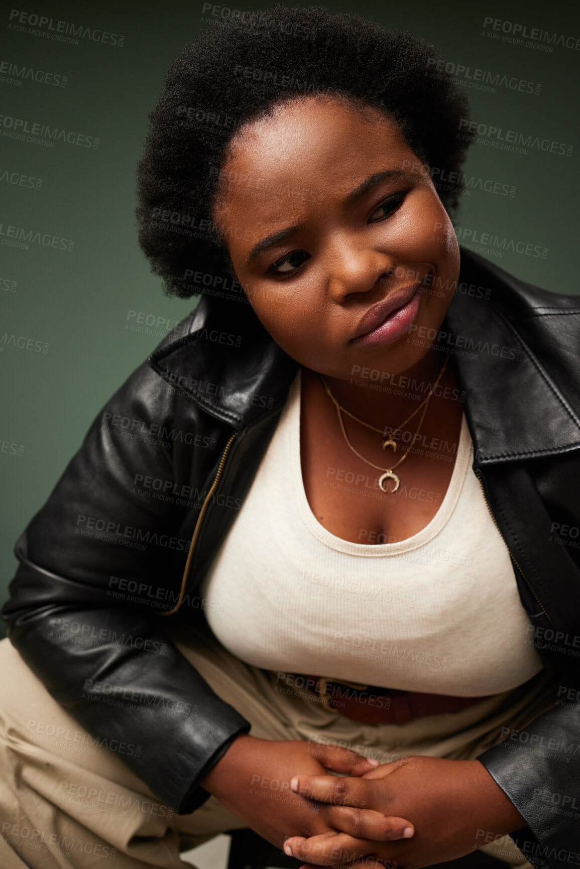 Buy stock photo African woman, emoji and pride in studio for fashion, style and confidence on green backdrop. Female person, cool and leather jacket for gen z, attitude and trendy outfit for college by background
