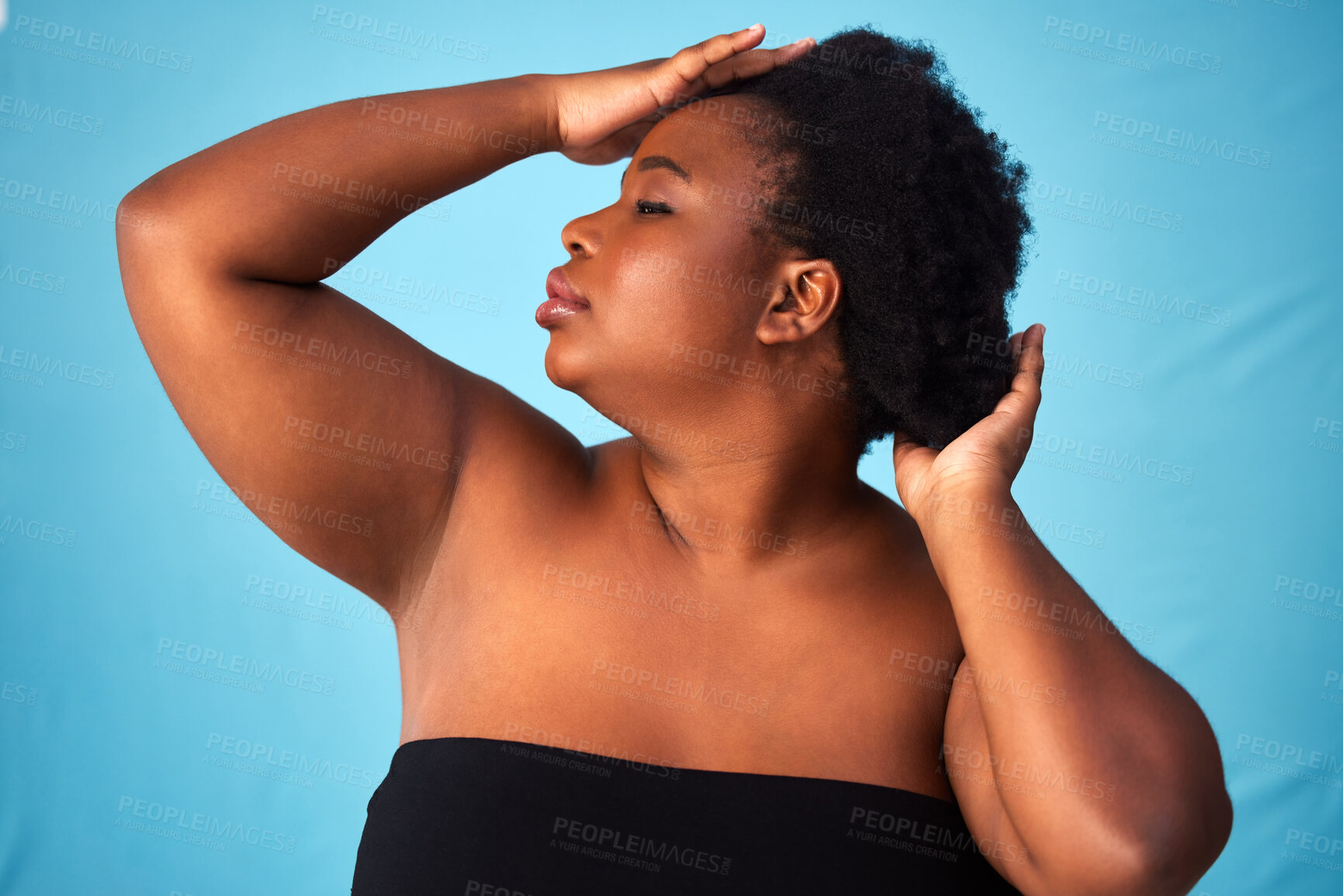 Buy stock photo Black woman, studio or hair care with natural or hands for aesthetics, afro with positivity for wellness. Female person, blue background or glow with hairstyle for cosmetic, confidence with plus size