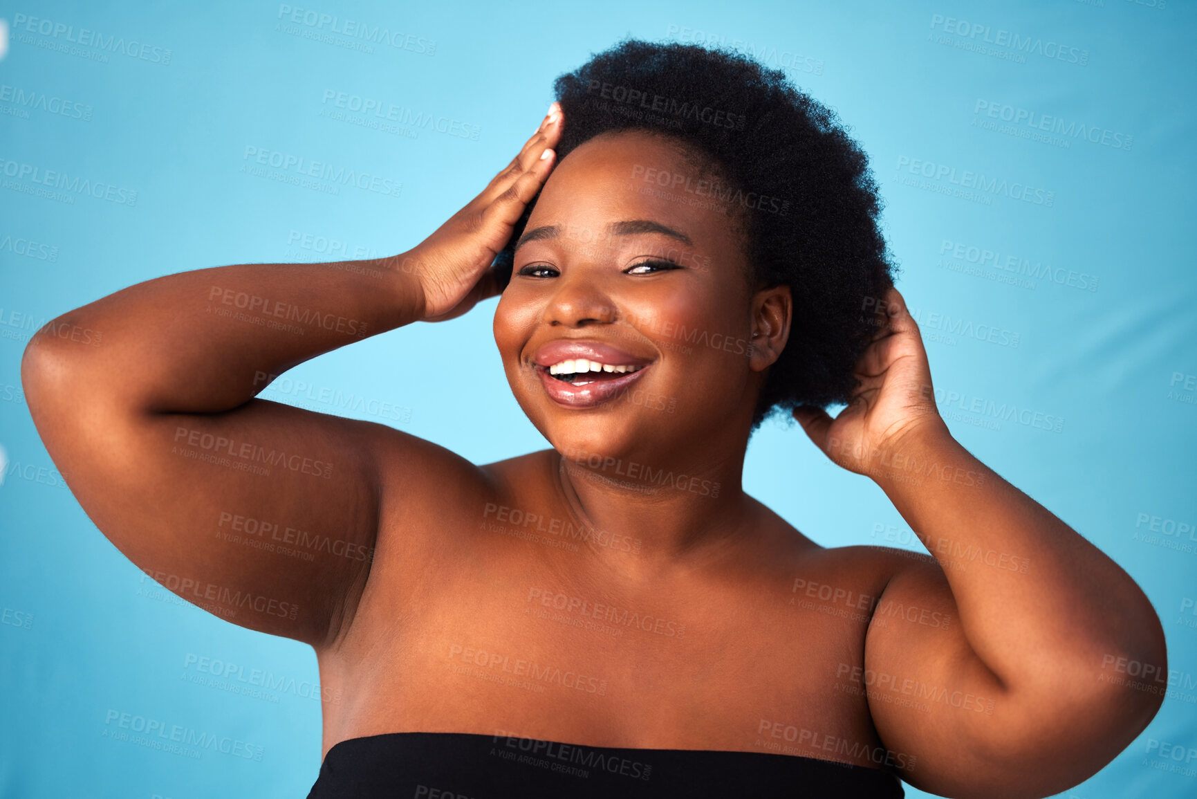 Buy stock photo Black woman, blue background or makeup in portrait or hands for aesthetics, skin with glow for wellness. Female person, plus size or afro with haircare and cosmetics, natural shine with confidence