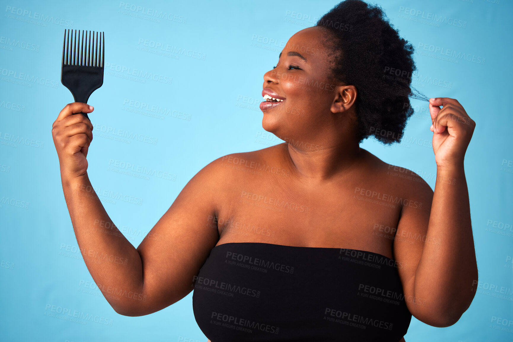Buy stock photo Beauty, comb and black woman with hair care in studio for natural, afro and salon treatment. Cosmetic, health and African female model with brush for curly hairstyle routine by blue background.