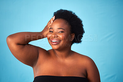 Buy stock photo Black woman, blue background and hair care with glow or hands for wellness, soft afro for aesthetics. Female person, studio and portrait with hairstyle for cosmetic, plus size with confidence