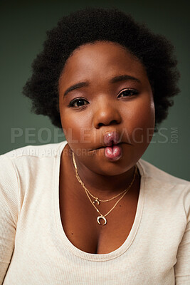 Buy stock photo Portrait, black woman and joke with pout or funny face for happy, playful and excited isolated in studio background. Female person, fish mouth and comic eyes for crazy, confident or silly humor