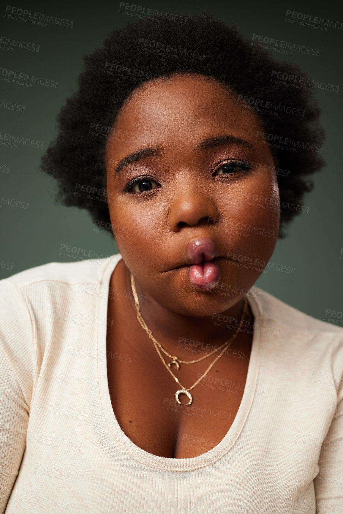 Buy stock photo Portrait, black woman and joke with pout or funny face for happy, playful and excited isolated in studio background. Female person, fish mouth and comic eyes for crazy, confident or silly humor