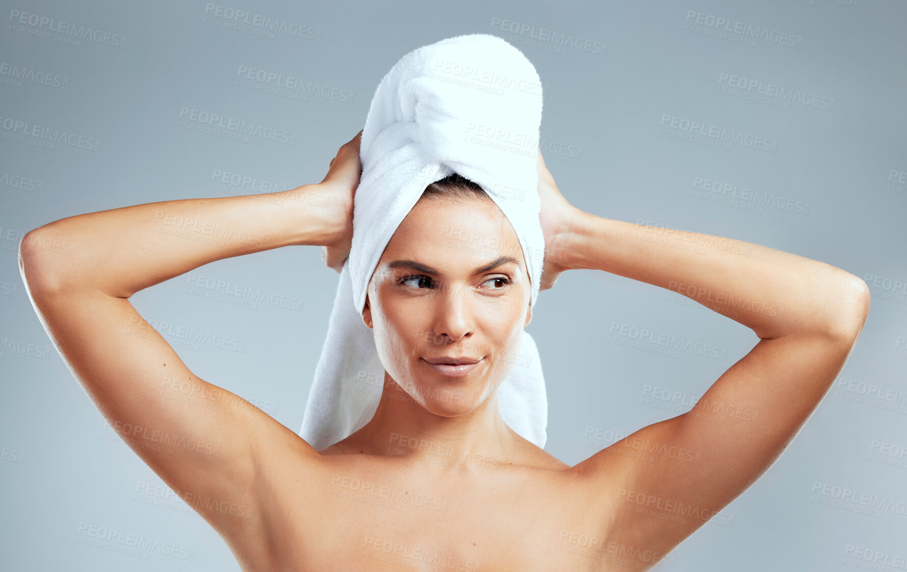 Buy stock photo Hair care, relax or woman with towel in studio for hygiene, skincare and washing with wellness or cloth. Shower, grey background and girl model cleaning with pride and confidence for beauty or health