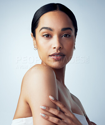 Buy stock photo Skincare, makeup and portrait of woman isolated on a white background for skin glow, shine and beauty for luxury. Face of young model or biracial person, natural cosmetics or dermatology in studio