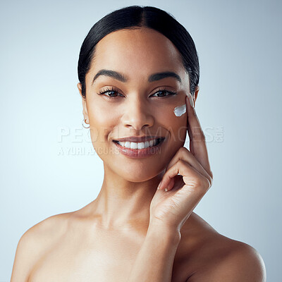 Buy stock photo Skincare, face cream and woman in studio for dermatology, wellness or hydration on grey background. Portrait, sunscreen and lady model relax with collagen, mask or lotion, beauty or anti aging facial