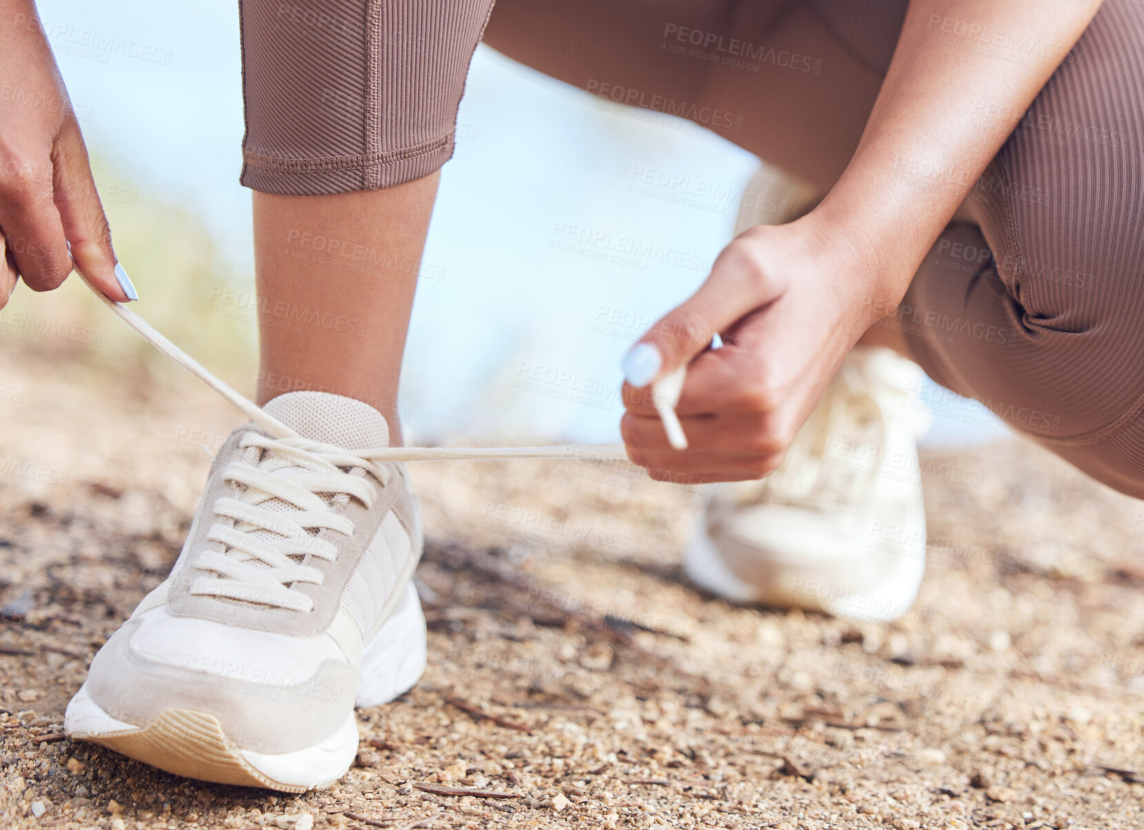 Buy stock photo Fitness, person and hands tie shoes before workout for cardio, running or marathon training. Wellness, feet and legs of runner for prepare, fasten sneakers or ready to start morning jog outdoor