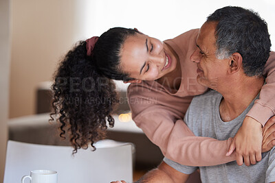 Buy stock photo Shot of a young woman hugging her father
