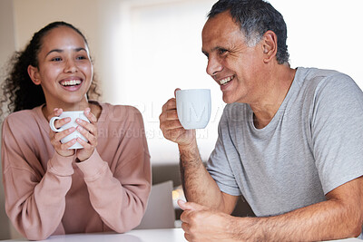Buy stock photo Mature dad, girl and happy with coffee in home on morning, breakfast and bonding with support and care. Parent, daughter and family with tea in kitchen, table and enjoy together with love or smile
