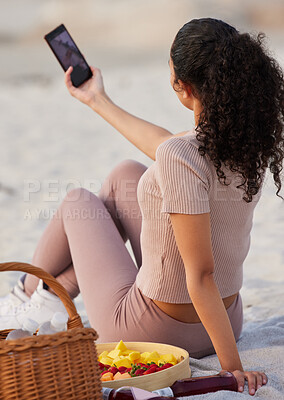 Buy stock photo Woman, photography and selfie at beach for holiday or content creation and fun on break in New York. Back view, female person and gen z on vacation for adventure, travel and picnic as influencer