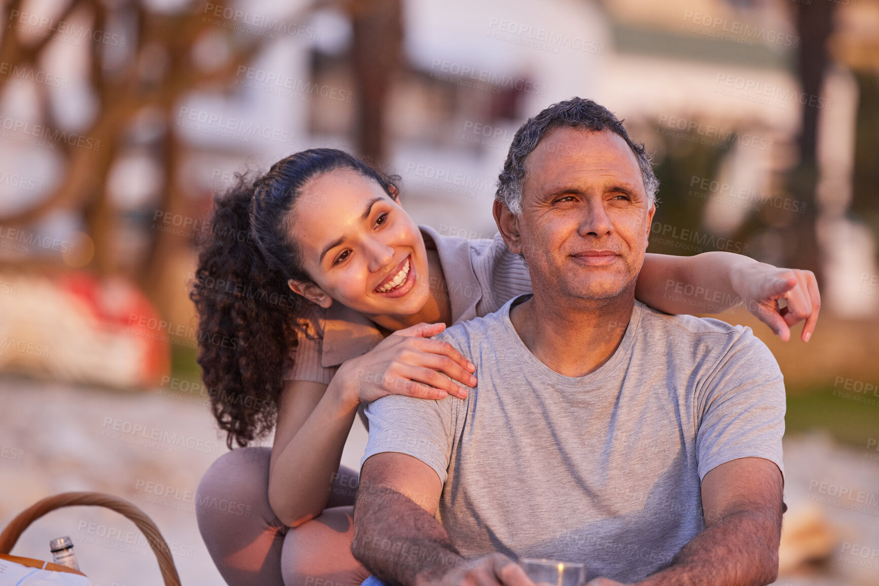 Buy stock photo Mature dad, girl and happy at beach for picnic on holiday, break and relax in Miami. Pointing, parent and daughter in summer vacation for adventure, travel and trip for bonding, support and sunset