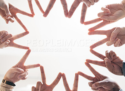 Buy stock photo Hands, business people and peace sign in circle, office and team building for solidarity in low angle. Colleagues, unity and connect for support or trust at work, white background and staff community