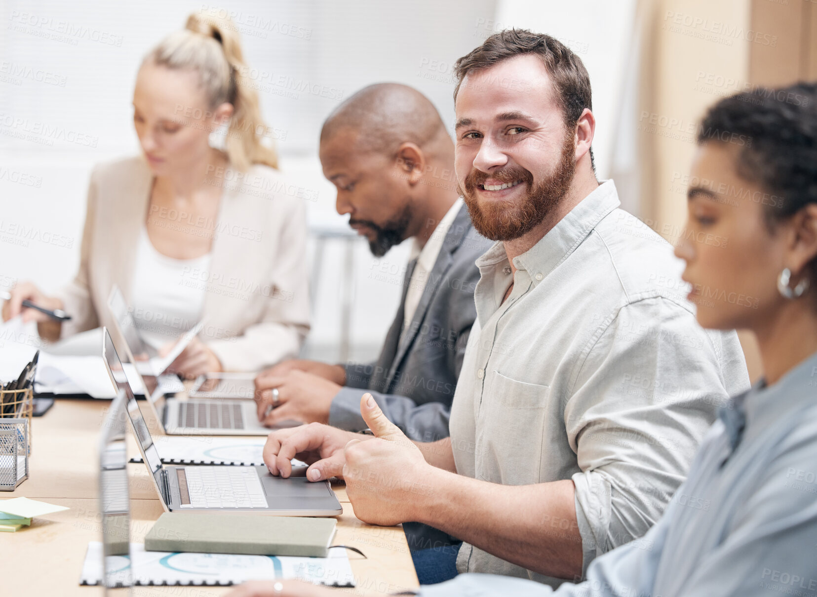 Buy stock photo Portrait, happy businessman and thumbs up in meeting, coworking and success in office. Face, smile and consultant with like hand gesture on laptop with team, support and collaboration in company